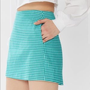 Green gingham mini skirt by Urban Outfitters